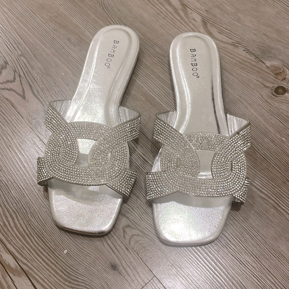 Metallic silver flats with gemstones